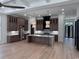 The kitchen is complete with a central island, modern lighting and stainless steel appliances at 5515 Porcher Ave., Myrtle Beach, SC 29577