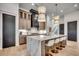 Kitchen featuring an island with a waterfall edge and modern pendant lighting at 5515 Porcher Ave., Myrtle Beach, SC 29577