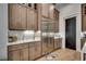Spacious kitchen featuring stainless steel appliances, custom cabinets and hardwood flooring at 5515 Porcher Ave., Myrtle Beach, SC 29577