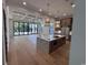 Bright, open living room featuring coffered ceiling and a view of the pool at 5515 Porcher Ave., Myrtle Beach, SC 29577