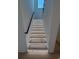 Modern staircase features tread lighting and sleek railing at 5515 Porcher Ave., Myrtle Beach, SC 29577