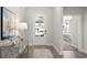 Entryway featuring a console table, a decorative lamp, and a view into the house at 585 Haven View Way, Murrells Inlet, SC 29576