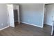 Bedroom featuring hardwood floors and closet space at 633 Redwood Ave. # 1, Myrtle Beach, SC 29577
