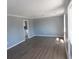 Bright living room featuring hardwood floors and natural light at 633 Redwood Ave. # 1, Myrtle Beach, SC 29577