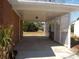 Covered parking space with lattice details, providing shade and an outdoor area at 637 Redwood Ave. # 1, Myrtle Beach, SC 29577