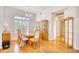 Dining area featuring wood flooring, a large cabinet and bright windows at 664 Pamlico Ct., Myrtle Beach, SC 29588