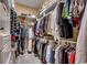 Organized walk-in closet featuring ample storage space with shelving, drawers, and hanging rods at 707 Compass Pointe Dr, North Myrtle Beach, SC 29582