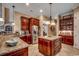 Open kitchen with stainless steel appliances, a center island, and granite countertops at 707 Compass Pointe Dr, North Myrtle Beach, SC 29582