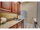 Laundry room with granite countertops, a sink, and a washer/dryer at 707 Compass Pointe Dr, North Myrtle Beach, SC 29582