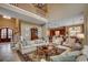 Open-concept living room with high ceilings, comfortable seating, and views into the kitchen at 707 Compass Pointe Dr, North Myrtle Beach, SC 29582