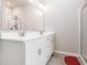 Bright bathroom with a double sink vanity, glass-enclosed shower, and tile flooring at 816 Wailea Circle, Little River, SC 29566