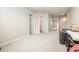 Bright hallway with neutral walls and carpet, showcasing doorways to other rooms at 816 Wailea Circle, Little River, SC 29566