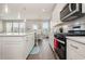 Modern kitchen featuring a center island, stainless steel appliances, and ample counter space at 816 Wailea Circle, Little River, SC 29566