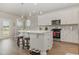 Modern kitchen featuring a center island with pendant lighting, stainless steel appliances, and sleek countertops at 816 Wailea Circle, Little River, SC 29566