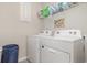 Functional laundry room with modern washer and dryer at 816 Wailea Circle, Little River, SC 29566