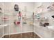 Walk-in pantry with ample shelving, providing plenty of storage space for food and household items at 816 Wailea Circle, Little River, SC 29566