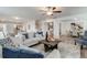 Open-concept living room featuring hardwood floors, comfortable seating, and an open floor plan at 903 Agostino Dr., Myrtle Beach, SC 29579