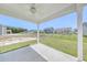 Covered patio offers views of the grassy backyard and other homes in the neighborhood at 915 Agostino Dr., Myrtle Beach, SC 29579