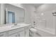 Well-lit bathroom featuring a single vanity, quartz countertop, and a tub with a shower at 915 Agostino Dr., Myrtle Beach, SC 29579