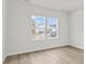 Cozy bedroom with wood-look flooring and a bright window view at 915 Agostino Dr., Myrtle Beach, SC 29579