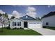 Charming single-Gathering home features a symmetrical facade, inviting curb appeal, and a two-car garage at 915 Agostino Dr., Myrtle Beach, SC 29579