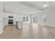 Spacious open-concept living area seamlessly connects kitchen, dining, and living spaces, filled with natural light at 915 Agostino Dr., Myrtle Beach, SC 29579