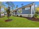 A green and manicured lawn is featured in the backyard of this home at 1001 Brantley L Brantley Ln., North Myrtle Beach, SC 29582