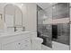 Modern bathroom showcasing black tile shower and vanity with white marble countertop at 1001 Brantley L Brantley Ln., North Myrtle Beach, SC 29582