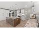 Spacious kitchen with modern island, stainless appliances, white cabinets, and ample counter space at 1001 Brantley L Brantley Ln., North Myrtle Beach, SC 29582