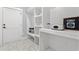 Well-organized laundry room featuring built-in shelving and practical design elements at 1001 Brantley L Brantley Ln., North Myrtle Beach, SC 29582
