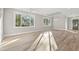 Bright and airy living room with large windows and beautiful wood floors at 1001 Brantley L Brantley Ln., North Myrtle Beach, SC 29582