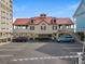 Exterior of the oceanfront restaurant with ample parking and nearby buildings at 1001 Brantley L Brantley Ln., North Myrtle Beach, SC 29582