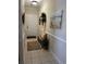 Charming entryway with tile flooring, a decorative bench, and coastal-themed decor creating a welcoming ambiance at 1001 Ray Costin Way # 1605, Murrells Inlet, SC 29576