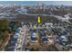 Aerial view of homes surrounded by a beautiful marsh landscape with a city view on the horizon at 1004 Marsh View Dr., North Myrtle Beach, SC 29582