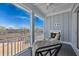 Outdoor porch with fireplace, comfortable seating, and views of the marsh at 1004 Marsh View Dr., North Myrtle Beach, SC 29582