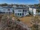 Beautiful home showcasing the rear exterior with a large yard, patio, and inviting outdoor space at 1004 Marsh View Dr., North Myrtle Beach, SC 29582