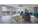 Relaxing sunroom with comfortable seating and views of the surrounding area at 1004 Marsh View Dr., North Myrtle Beach, SC 29582