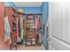 Walk-in closet with custom wood shelving, drawers and hanging storage for optimal organization at 110 Echaw Dr., Conway, SC 29526