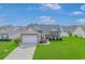Charming single-story home with a well-maintained front lawn and an attached two-car garage at 110 Echaw Dr., Conway, SC 29526