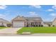 Charming single-story home with well-maintained lawn, attached two-car garage, and inviting front porch at 110 Echaw Dr., Conway, SC 29526