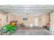 Spacious two car garage with tools, lawn equipment, and access door at 110 Echaw Dr., Conway, SC 29526