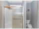 Neutral toned bathroom with a framed glass shower enclosure at 110 Echaw Dr., Conway, SC 29526