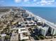 Panoramic aerial view of the coastline, showing the beach and the city at 1105 S Ocean Blvd. # 220, Myrtle Beach, SC 29577