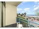Balcony with a blue metal railing overlooking the beach and ocean view at 1105 S Ocean Blvd. # 220, Myrtle Beach, SC 29577