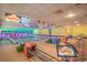 Bowling alley with multiple lanes and monitors displaying scores and food images at 1105 S Ocean Blvd. # 220, Myrtle Beach, SC 29577