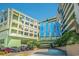 Attractive building with green accents, blue panes, and ample parking at Coral Beach Resort at 1105 S Ocean Blvd. # 220, Myrtle Beach, SC 29577