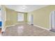 Spacious living room featuring arched doorways and tile flooring at 111 S Poplar Dr., Surfside Beach, SC 29575