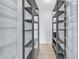 A pantry with metal wire shelves and tile flooring at 111 S Poplar Dr., Surfside Beach, SC 29575