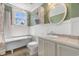 Charming bathroom features a clawfoot tub, vanity and wood-look floors at 112 S Rosemary Ave., Andrews, SC 29510