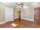 Bedroom with wood-look floors, and bright natural light at 112 S Rosemary Ave., Andrews, SC 29510